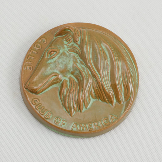 Frankoma <br> Collie Medallion <br> c. 1955, H. 4" <br> Prairie Green <br> Sapulpa Clay, Dated 4-2-55 <br> <br> Free Shipping