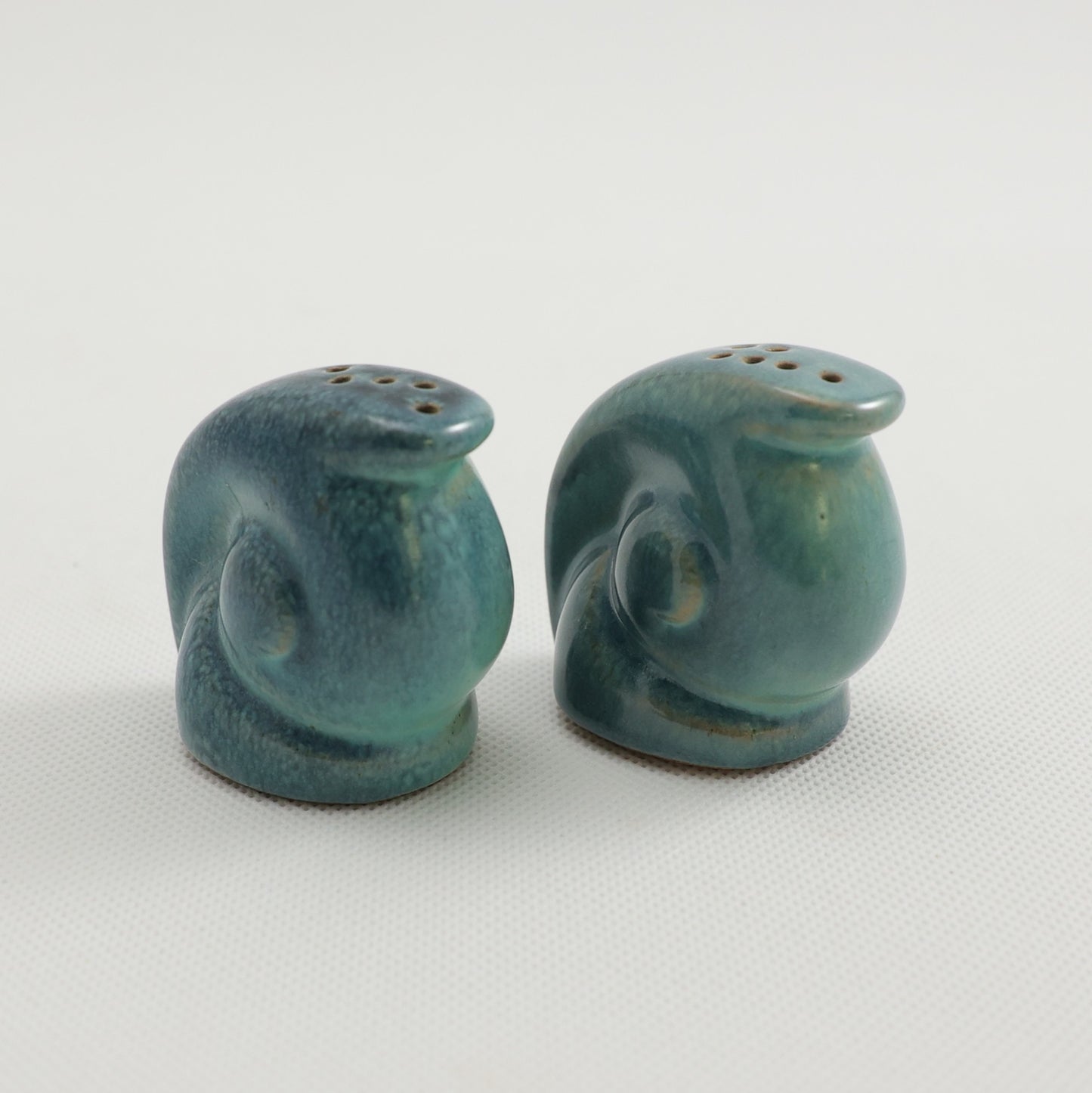 Frankoma <br> #558H Snail Shakers <br> c. 1942, H. 1 3/4" <br> Indian Blue <br> Ada Clay, Unmarked <br> <br> Free Shipping