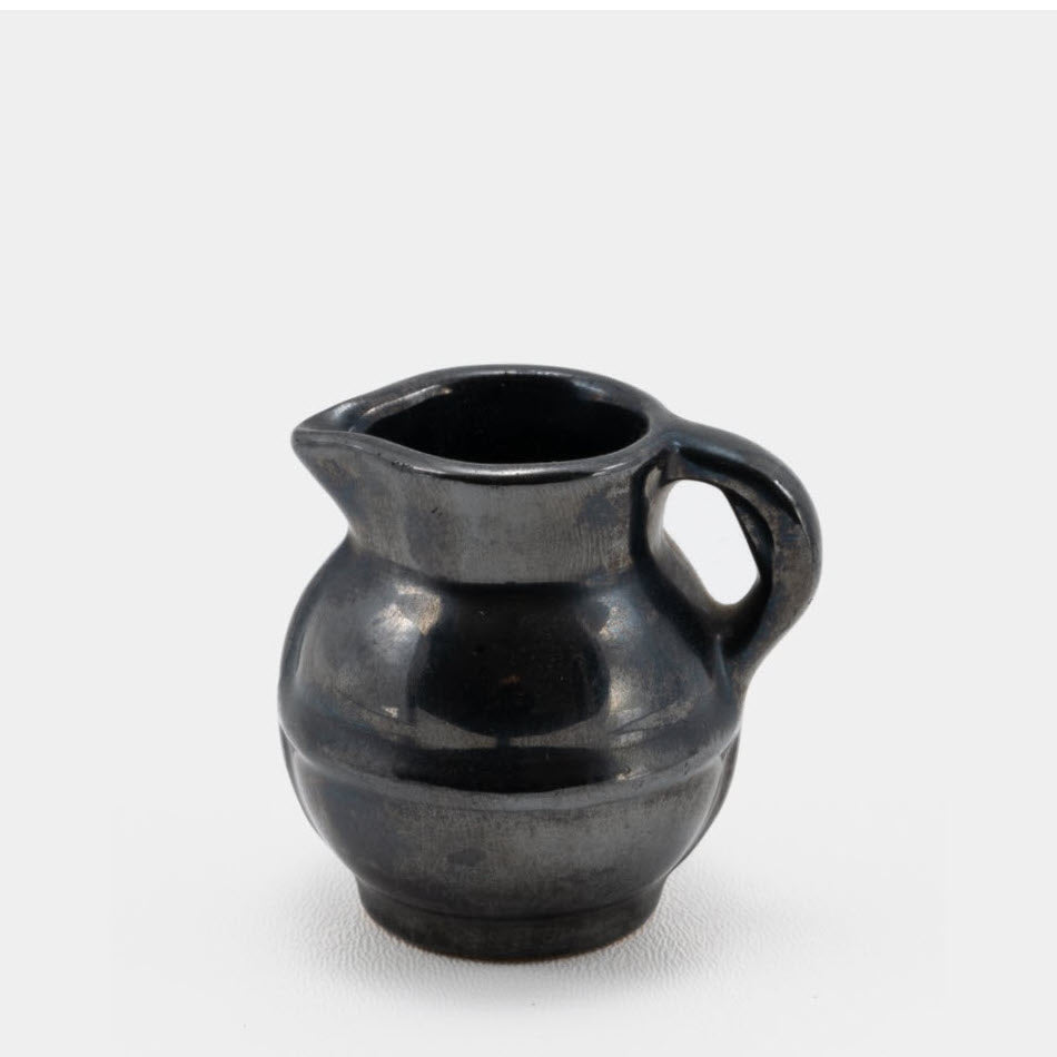 Frankoma <br> #550 Guernsey Pitcher <br> c. 1936-1938, H. 2 1/4" <br> Onyx Black <br> Ada Clay, Round O