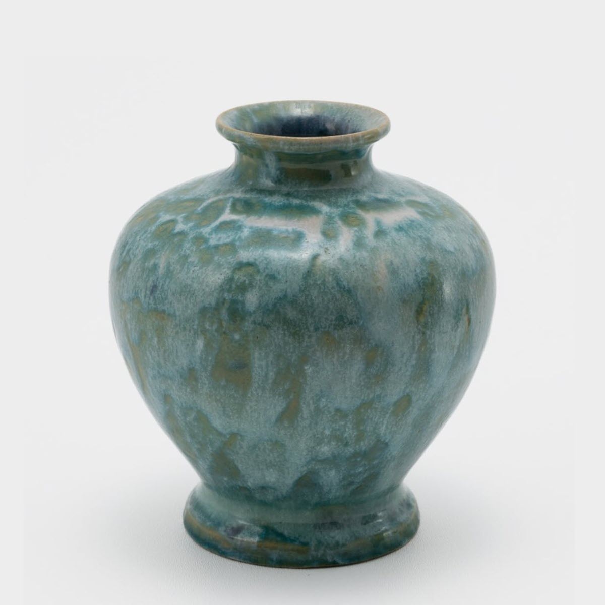 John Frank <br> OU Tepee Vase <br> 1928, H. 6 1/2" <br> Bluish Green <br> Ada Clay, JNF '28