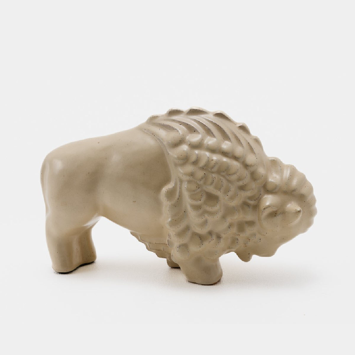 Frankoma <br> #119 Buffalo (Large) <br> c. 1936-1938, H. 4" <br> Ivory Glaze <br> Ada Clay, Round O