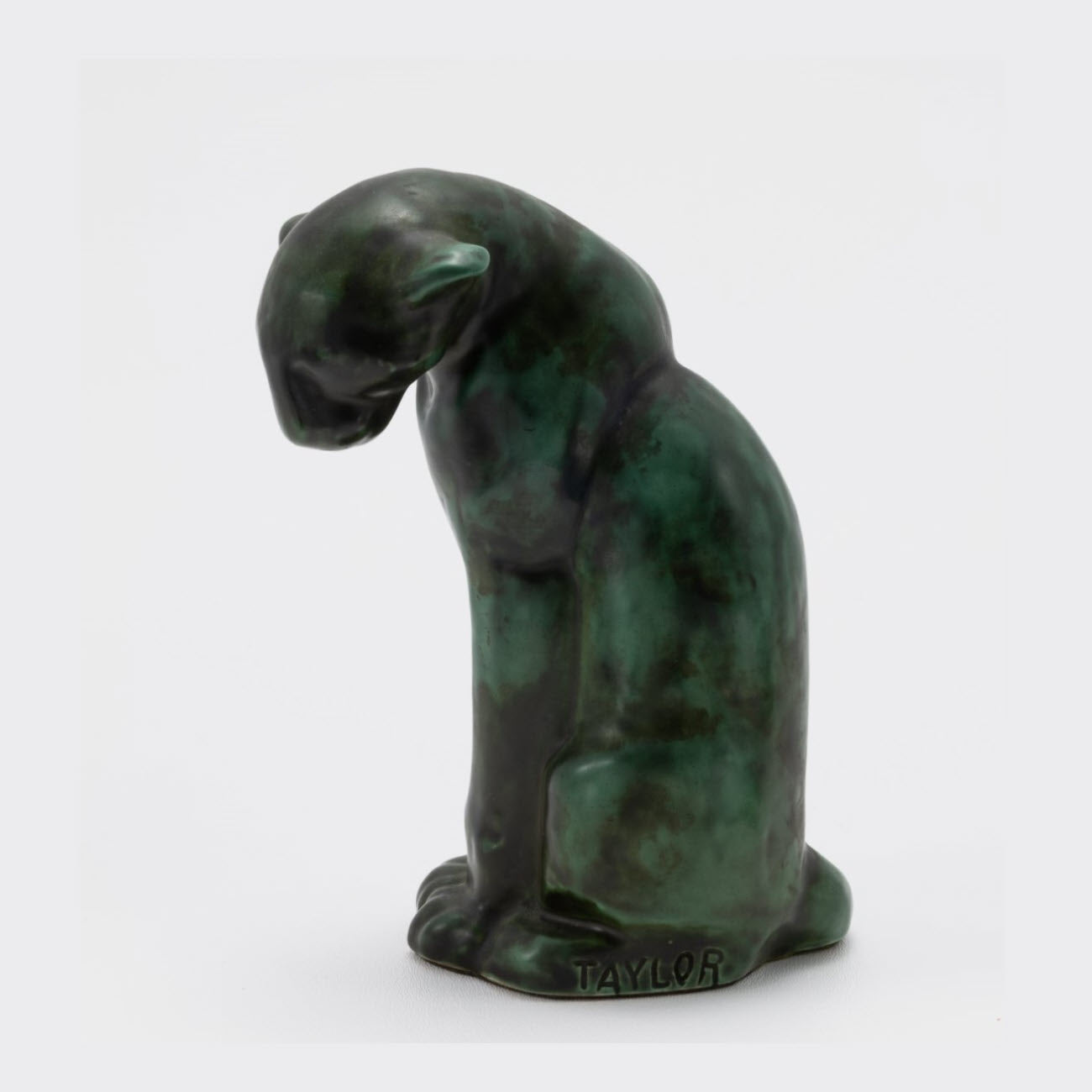 Frankoma <br> #114 Seated Puma <br> c. 1936-1938, H. 7 3/4" <br> Pompeian Bronze <br> Ada Clay, Cat Mark