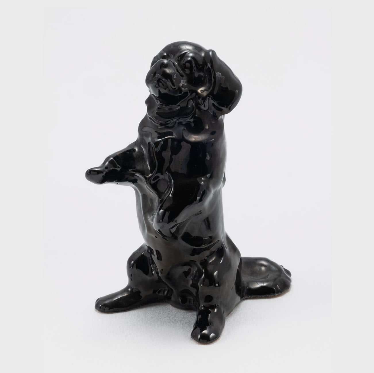 Frankoma <br> #112 Pekingese Dog <br> c. 1936-1938, H. 7 3/4" <br> Onyx Black <br> Ada Clay, Cat Mark