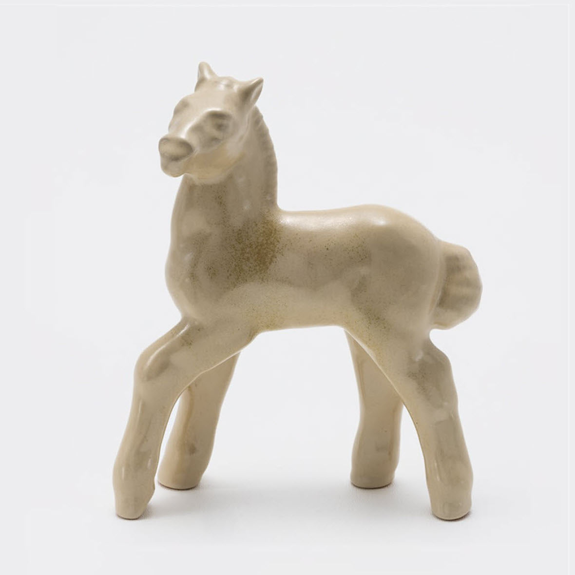 Frankoma <br> #117 Prancing Colt <br> c. 1936-1938, H. 8" <br> Ivory Glaze <br> Ada Clay, Unmarked