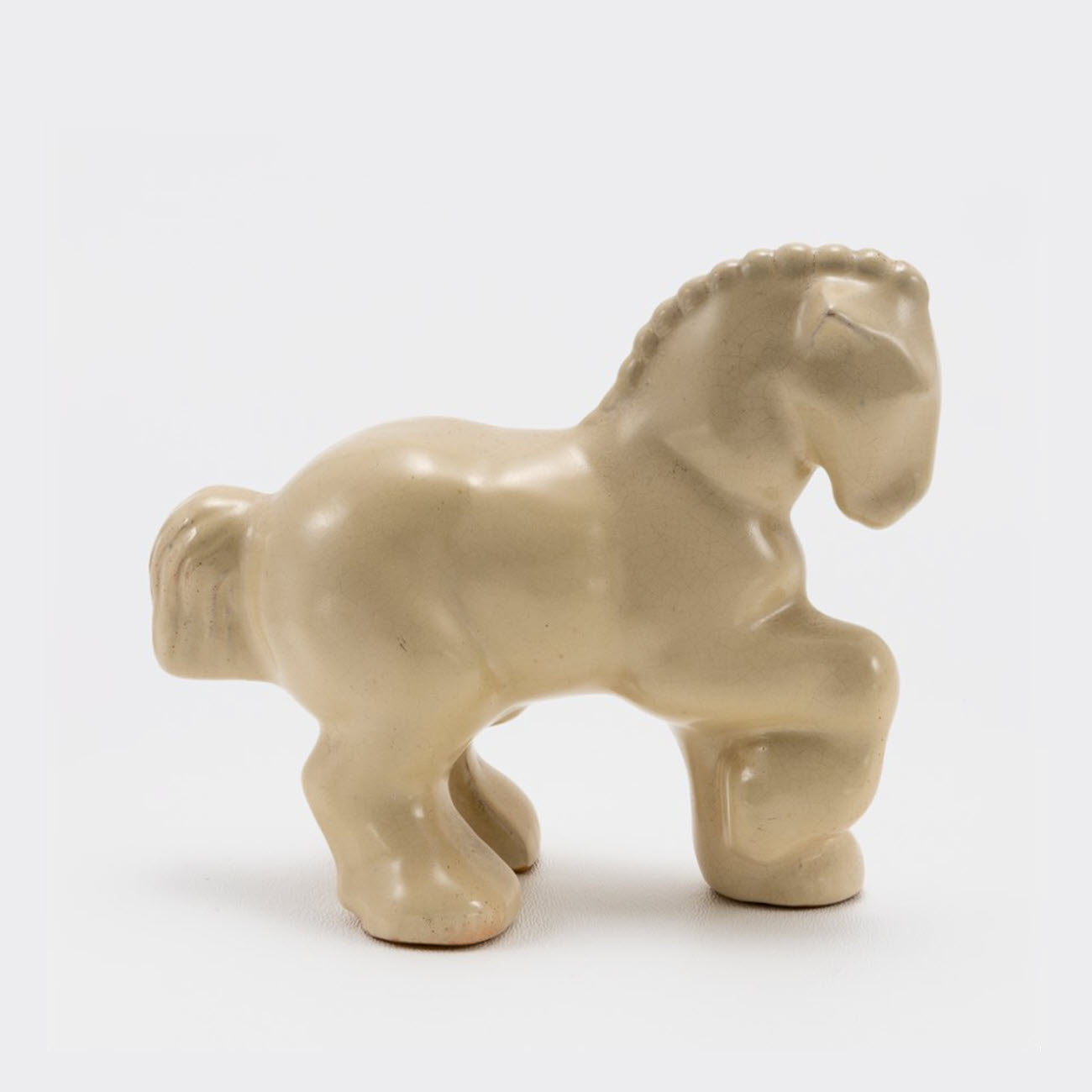 Frankoma <br> #108 Prancing Percheron <br> c. 1936-1938, H. 3 3/4" <br> Ivory Glaze <br> Ada Clay, Unmarked