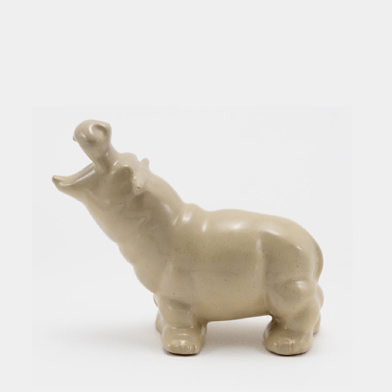 Frankoma <br> #140 Hippo <br> c. 1936-1938, H. 4 7/8" <br> Ivory Glaze <br> Ada Clay, Round O