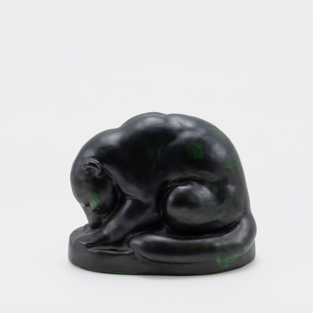 Frank Potteries <br> #137 Coati Mundi <br> c. 1933-1934, H. 4 3/4" <br> Pompeian Bronze <br> Ada Clay, Unmarked