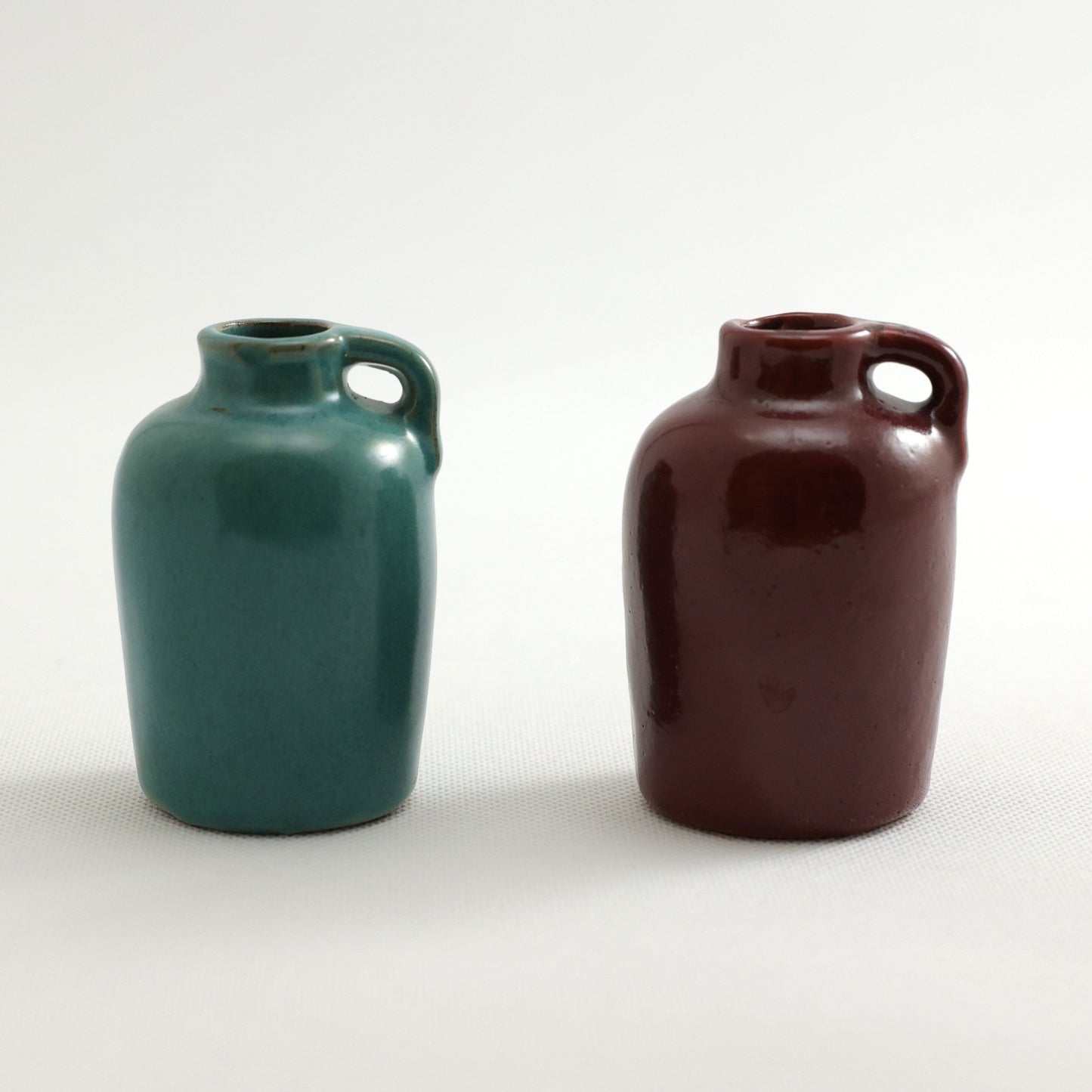 Frankoma <br> #559 Pair of Jugs <br> c. 1950's, H. 3 1/2" <br> Turquoise | Maroon <br> Ada Clay, Oblong 0 <br> <br> Free Shipping